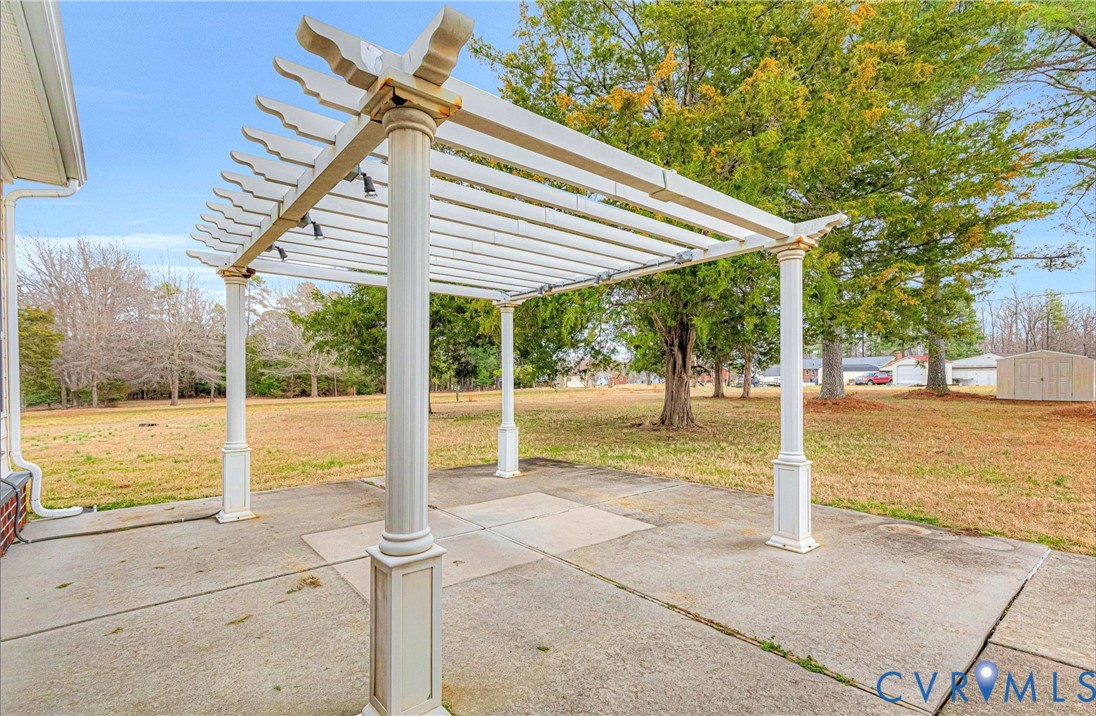 5025 Hurop Road Sandston, VA 23150 - Photo 45 of 57 a view of a house with backyard and porch