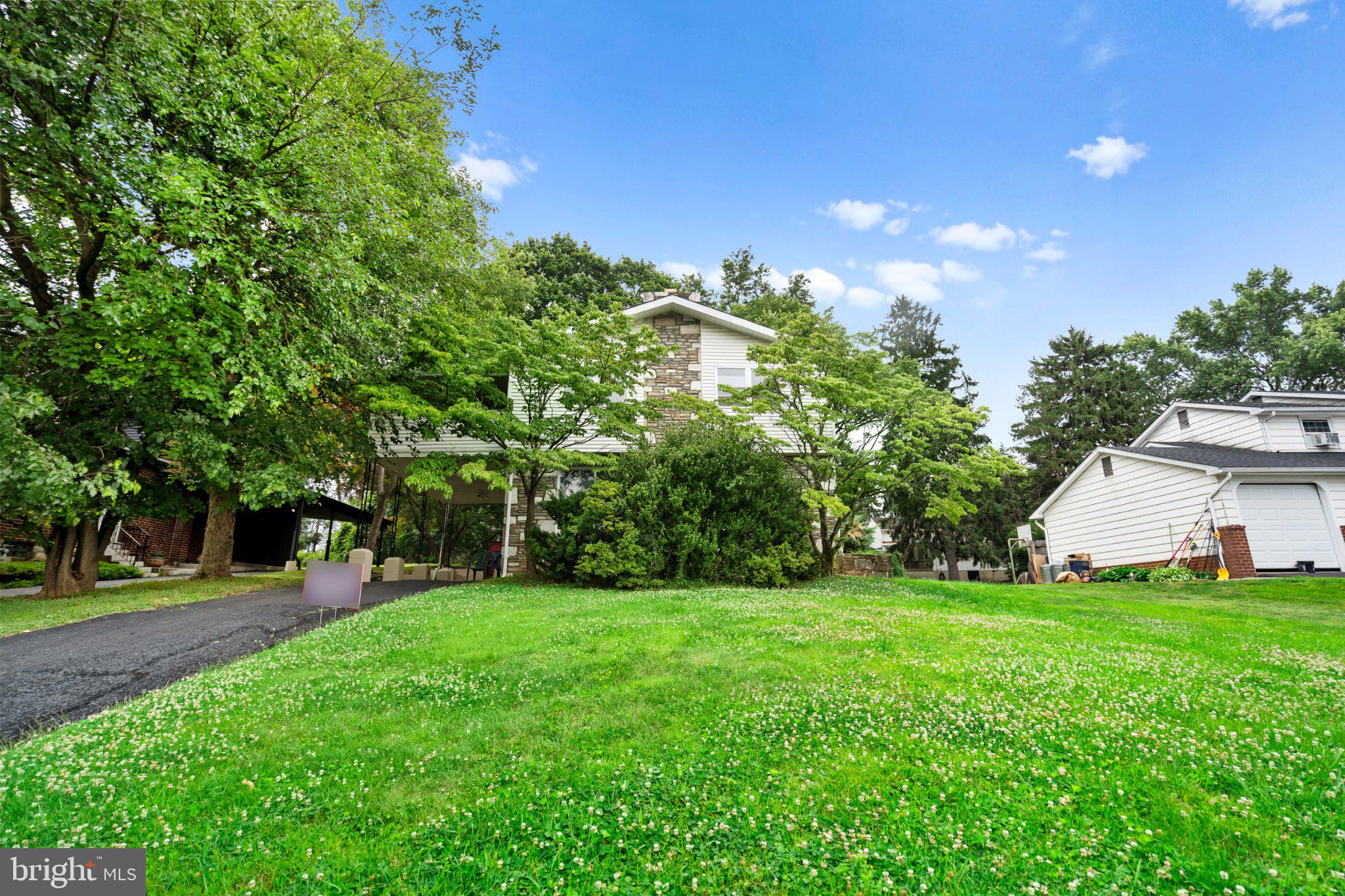 609 Foster Road Cheltenham, PA 19012 - Photo 3 of 44 Charming home amid lush greenery.