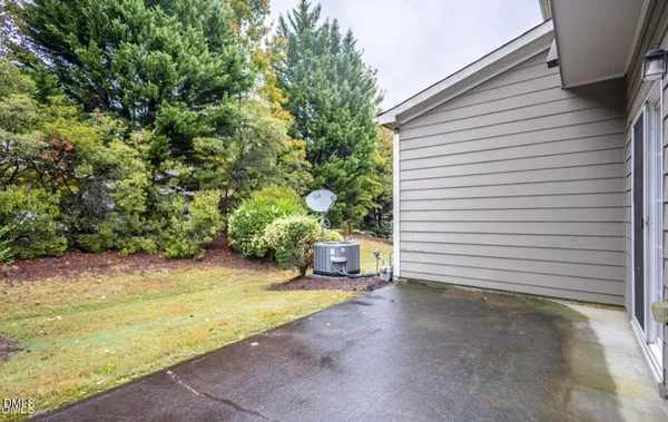 a view of a backyard of the house