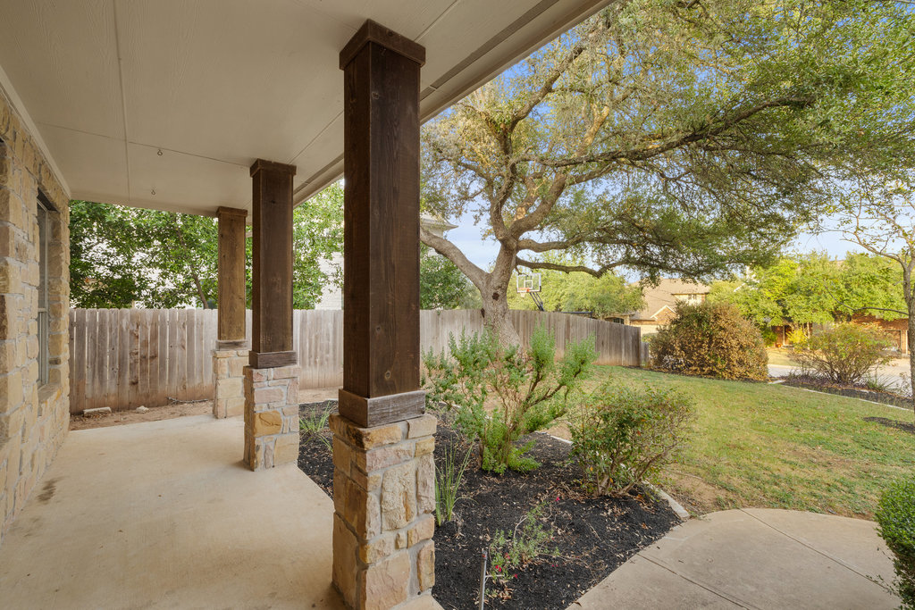 908 Golden Palomino Court Austin, TX 78732 - Photo 4 of 40 a house view with garden space