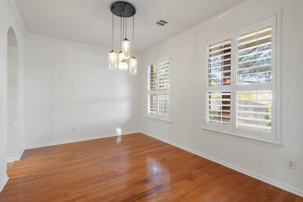 908 Golden Palomino Court Austin, TX 78732 - Photo 6 of 40 a view of an empty room with a window