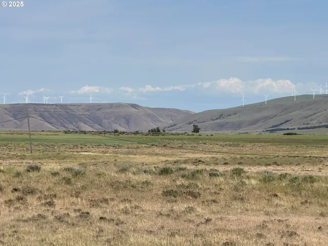 a view of an ocean beach and mountain
