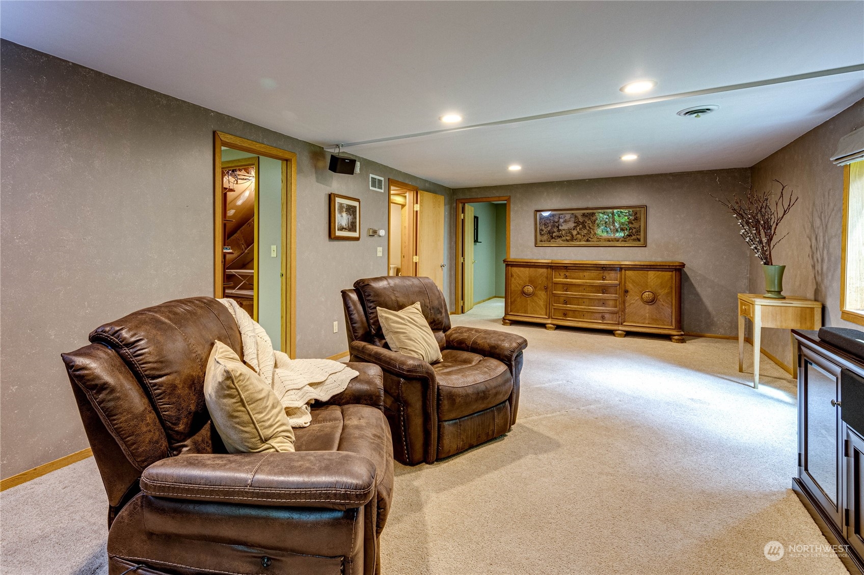 17129 North Road Bothell, WA 98012 - Photo 17 of 40 a living room with furniture and a flat screen tv