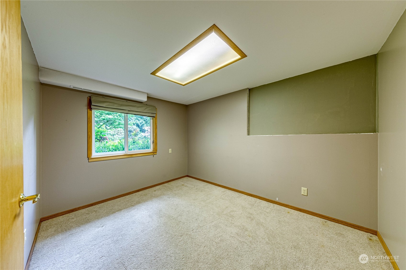 17129 North Road Bothell, WA 98012 - Photo 18 of 40 a view of an empty room with a window