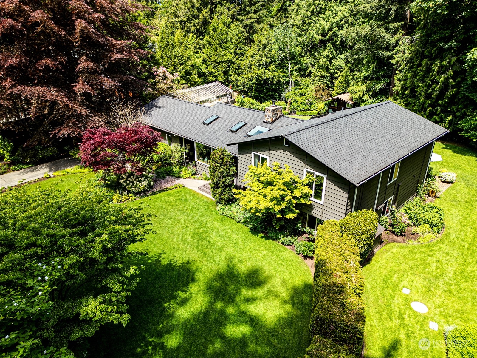 17129 North Road Bothell, WA 98012 - Photo 21 of 40 a aerial view of a house with yard and swimming pool