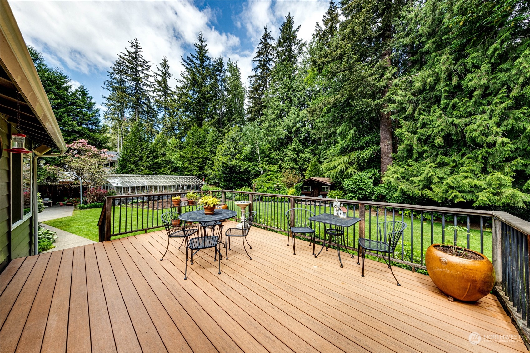 17129 North Road Bothell, WA 98012 - Photo 23 of 40 a view of roof deck with chair and wooden floor