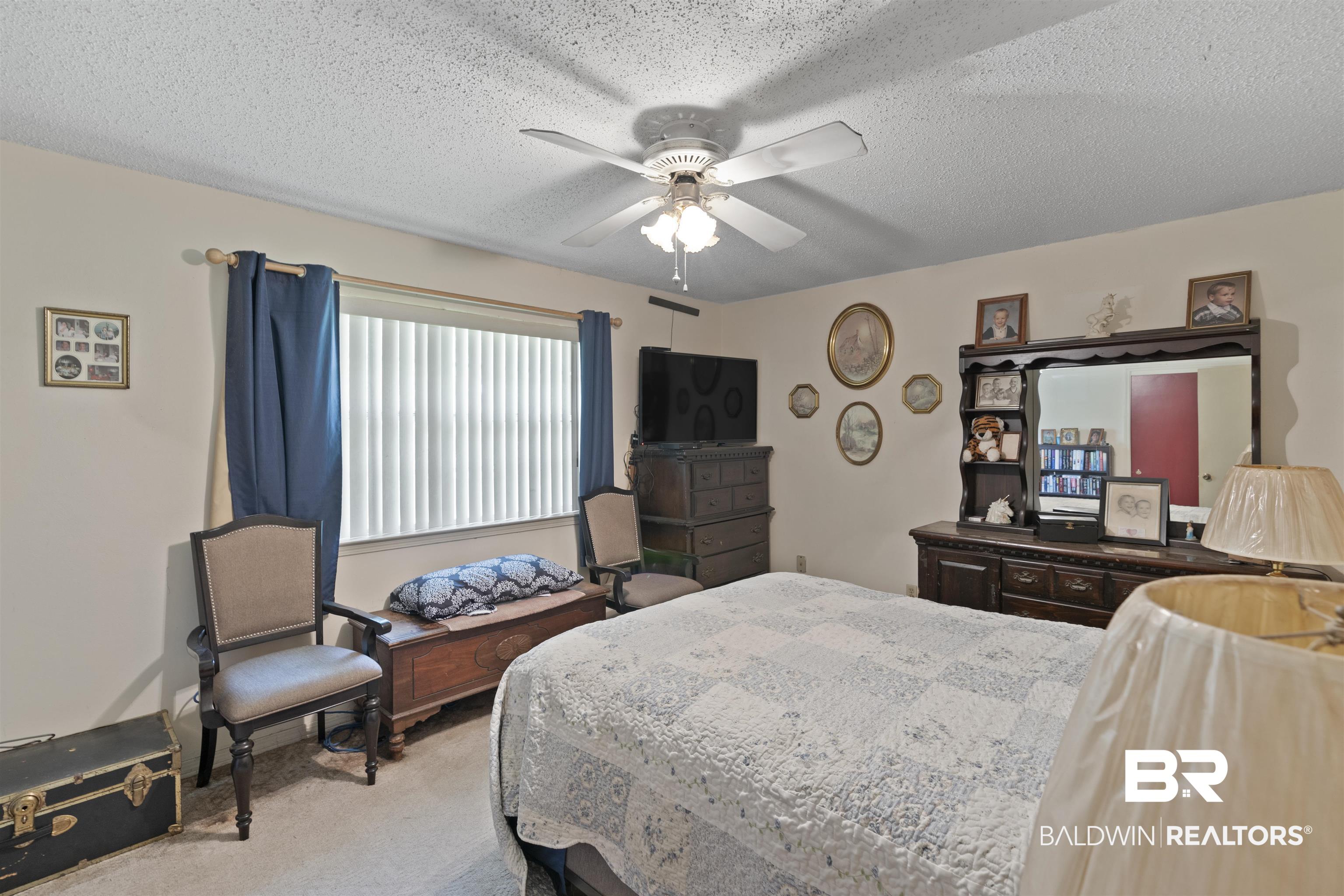 83 Grimes Lane Loxley, AL 36551 - Photo 13 of 16 Primary Bedroom