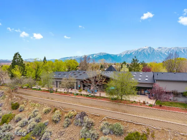a living room with furniture and a gate