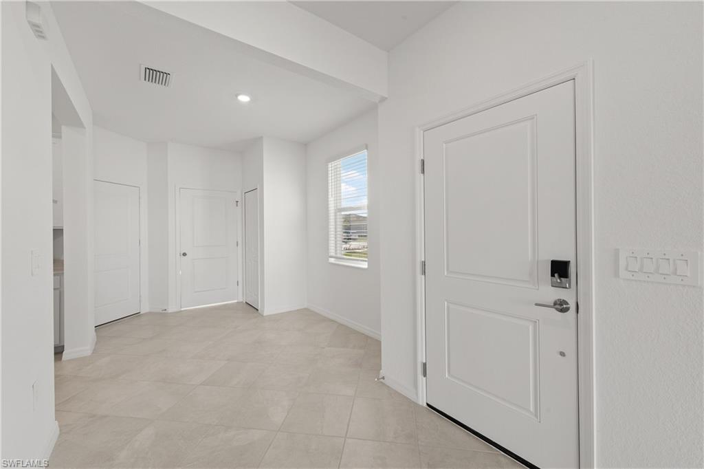 15035 White Pearl Road Babcock Ranch, FL 33982 - Photo 11 of 43 a view of an empty room