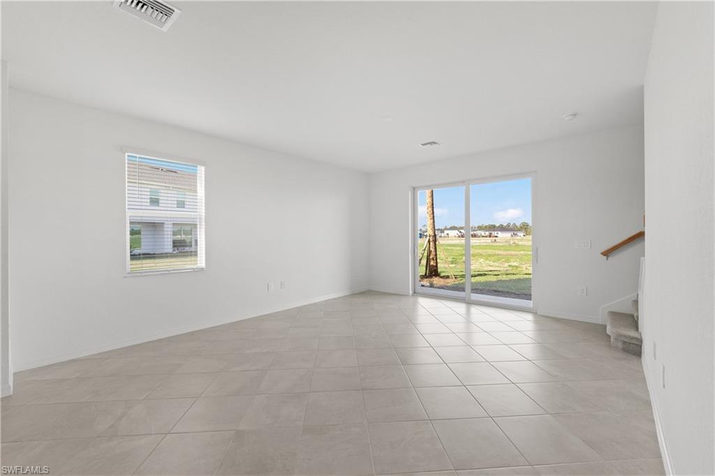 15035 White Pearl Road Babcock Ranch, FL 33982 - Photo 26 of 43 a view of an empty room with a window