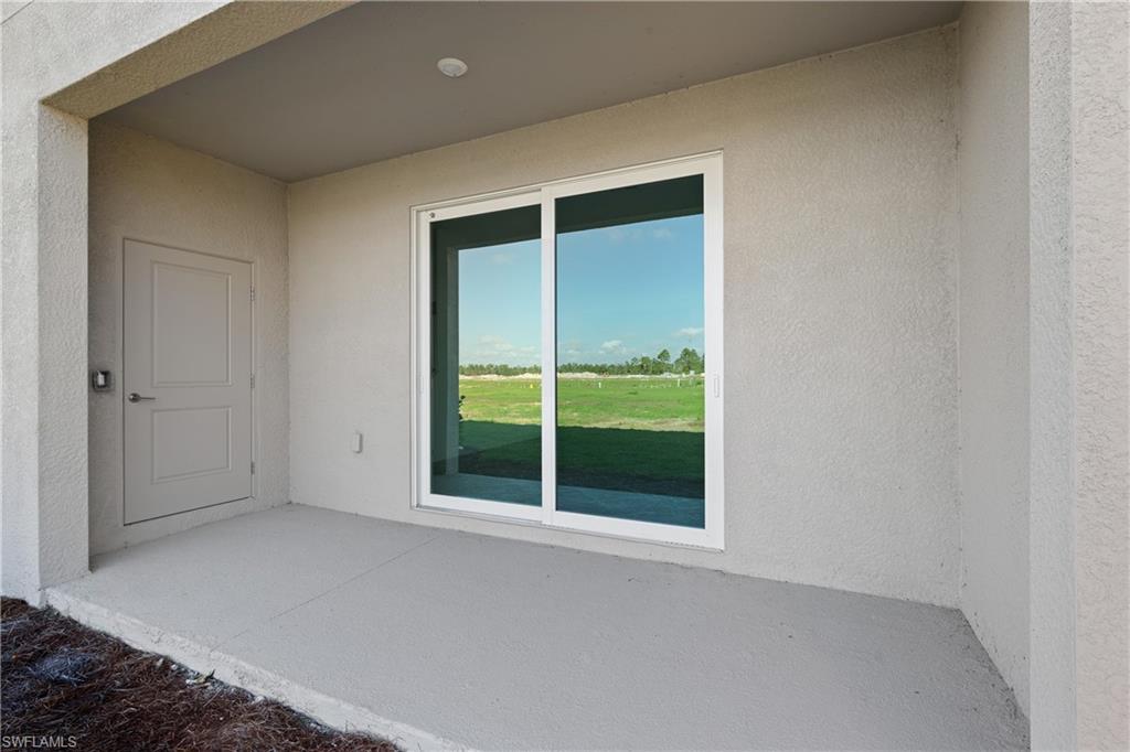 15035 White Pearl Road Babcock Ranch, FL 33982 - Photo 8 of 43 a view of an empty room with a window