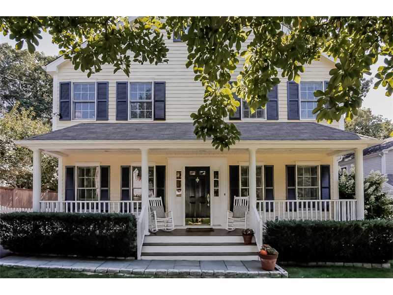 18 Devon Road Darien, CT 06820 - Photo 1 of 25 a view of a brick house with a large window