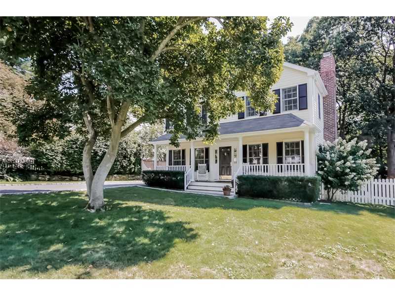 18 Devon Road Darien, CT 06820 - Photo 2 of 25 a front view of a house with garden