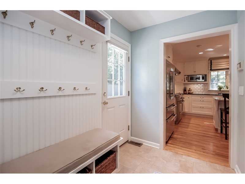 18 Devon Road Darien, CT 06820 - Photo 12 of 25 a kitchen with cabinets and wooden floor