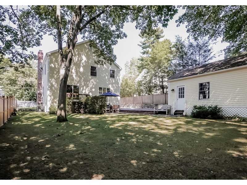 18 Devon Road Darien, CT 06820 - Photo 19 of 25 a view of a yard with a tree