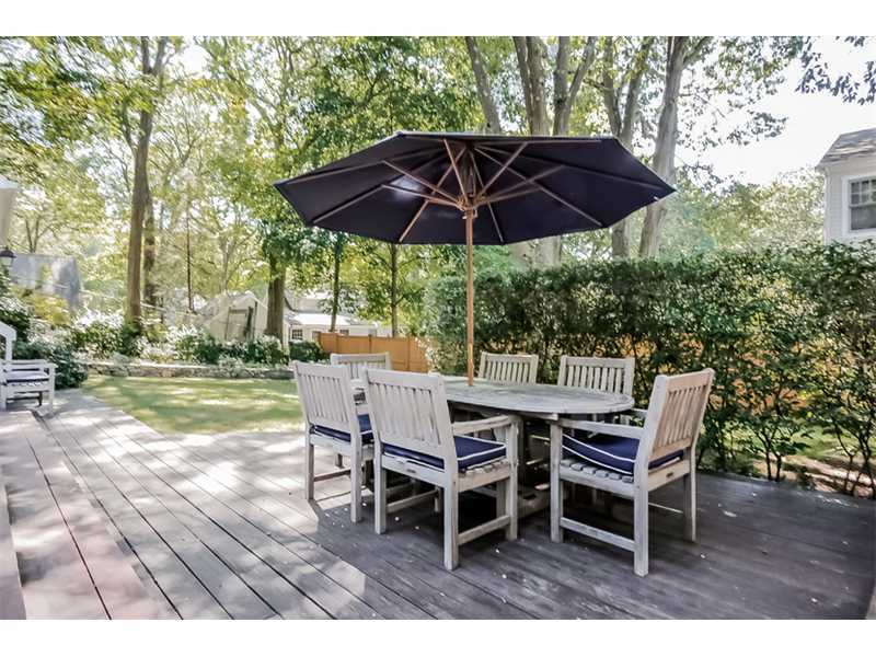 18 Devon Road Darien, CT 06820 - Photo 21 of 25 a view of a backyard with sitting area and furniture