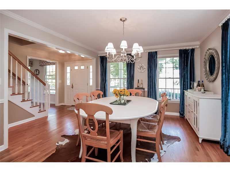 18 Devon Road Darien, CT 06820 - Photo 6 of 25 a view of a dining room with furniture and wooden floor