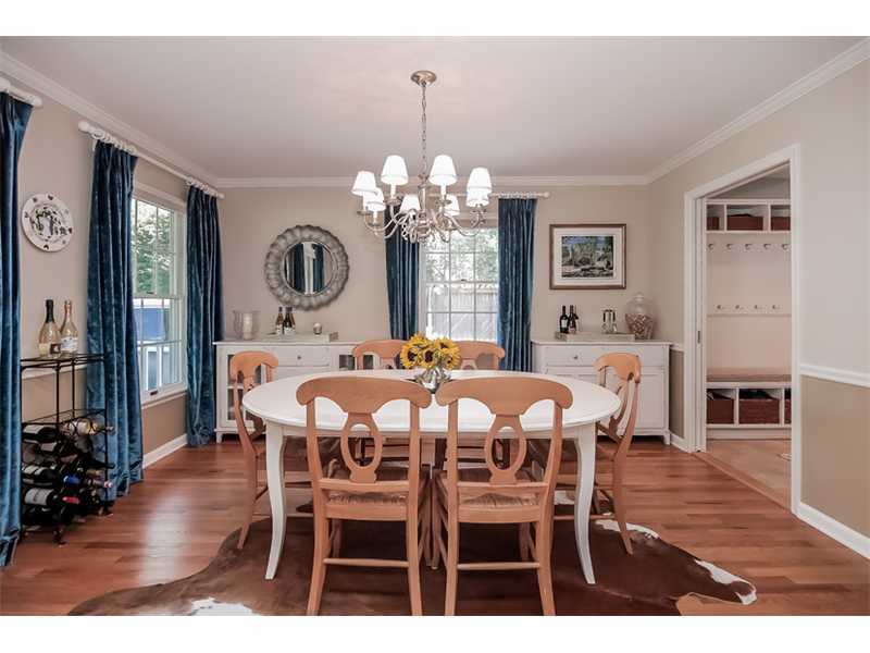 18 Devon Road Darien, CT 06820 - Photo 7 of 25 a view of a dining room with furniture and wooden floor