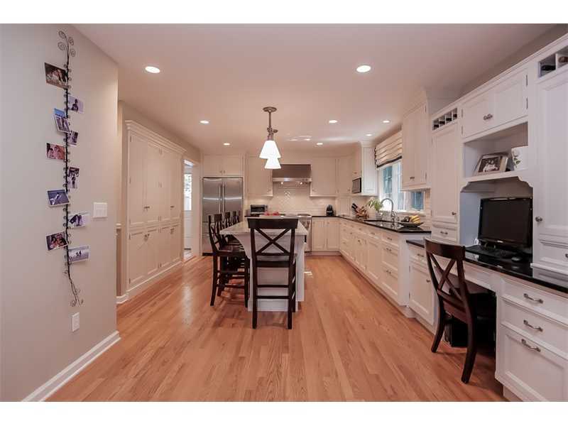 18 Devon Road Darien, CT 06820 - Photo 9 of 25 a dining room with furniture and wooden floor