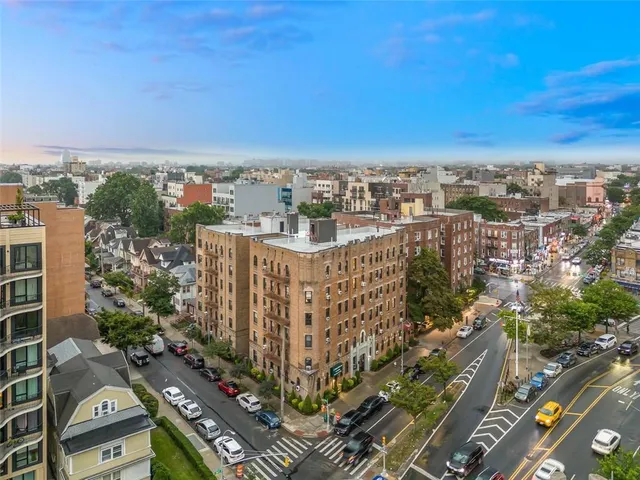 a view of a city with tall buildings