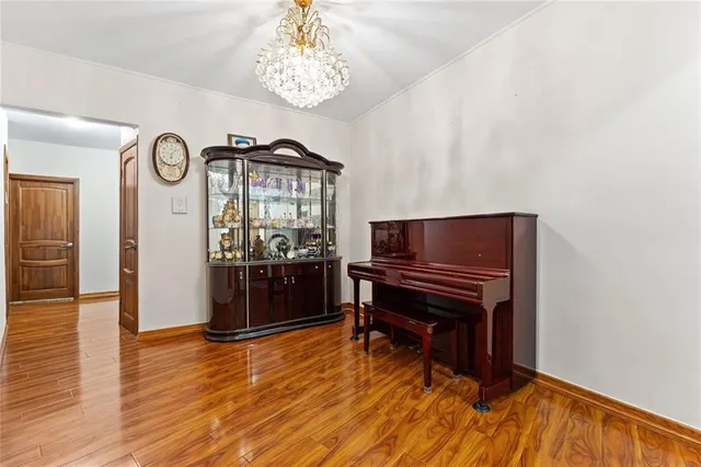 a view of a livingroom with furniture and window