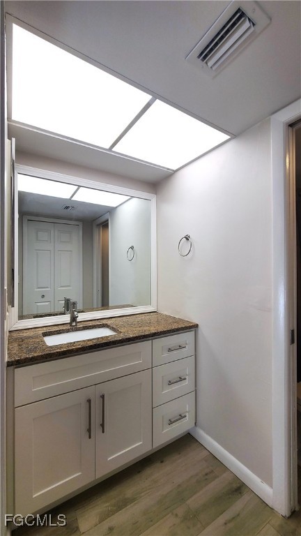 930 Southwest 47th Terrace, Unit 7 Cape Coral, FL 33914 - Photo 19 of 29 a bathroom with a sink and mirror