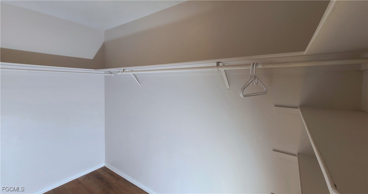 930 Southwest 47th Terrace, Unit 7 Cape Coral, FL 33914 - Photo 22 of 29 a view of a room with racks on the wall