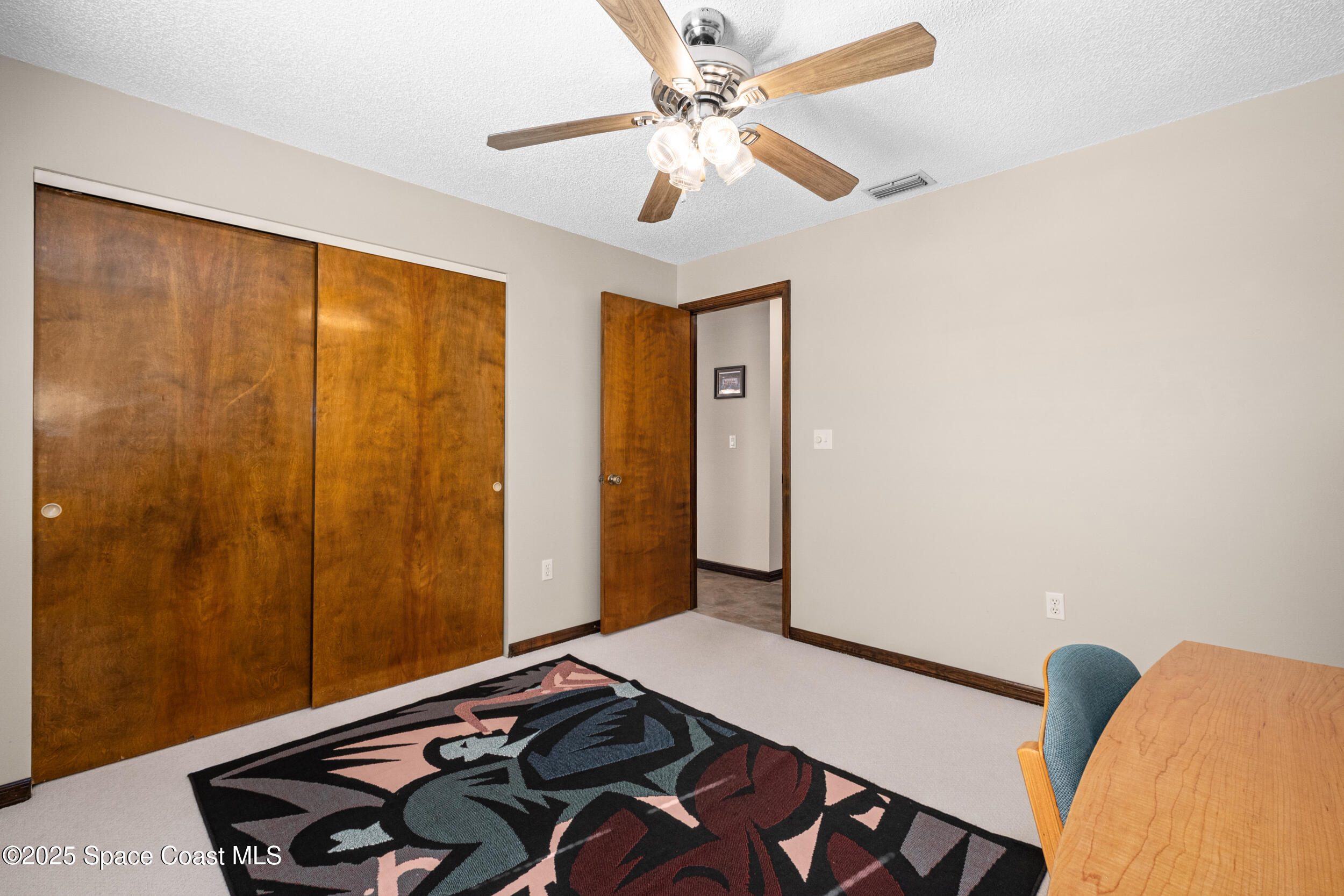 1170 Faulkingham Road Merritt Island, FL 32952 - Photo 18 of 31 a room with furniture and a window
