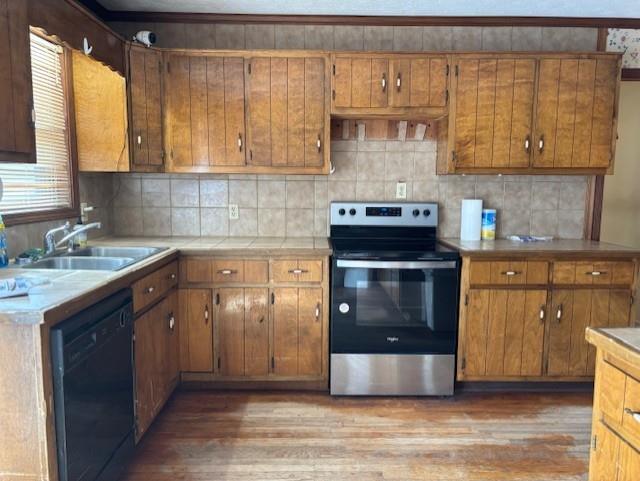 2215 Oak Hill Road Covington, GA 30016 - Photo 11 of 36 a kitchen with stainless steel appliances granite countertop a stove a sink and a microwave