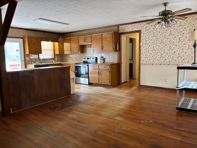2215 Oak Hill Road Covington, GA 30016 - Photo 13 of 36 a kitchen with granite countertop wooden floors and wide window