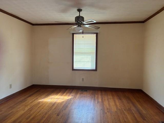 2215 Oak Hill Road Covington, GA 30016 - Photo 18 of 36 a view of empty room with wooden floor and fan