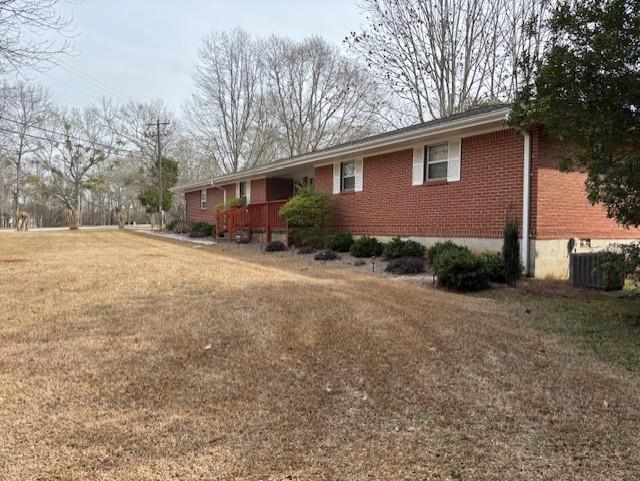 2215 Oak Hill Road Covington, GA 30016 - Photo 3 of 36 a view of a house with a yard