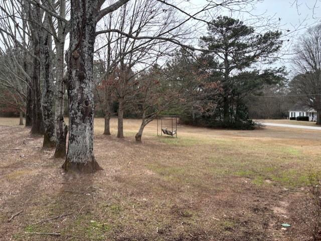 2215 Oak Hill Road Covington, GA 30016 - Photo 31 of 36 a view of outdoor space with trees