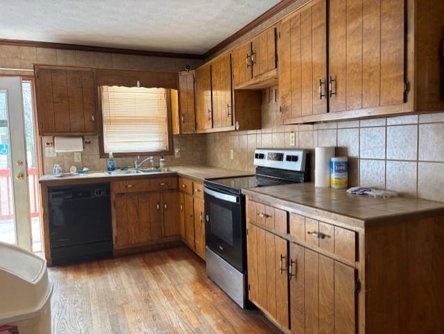 2215 Oak Hill Road Covington, GA 30016 - Photo 10 of 36 a kitchen with stainless steel appliances granite countertop a stove a sink and a microwave