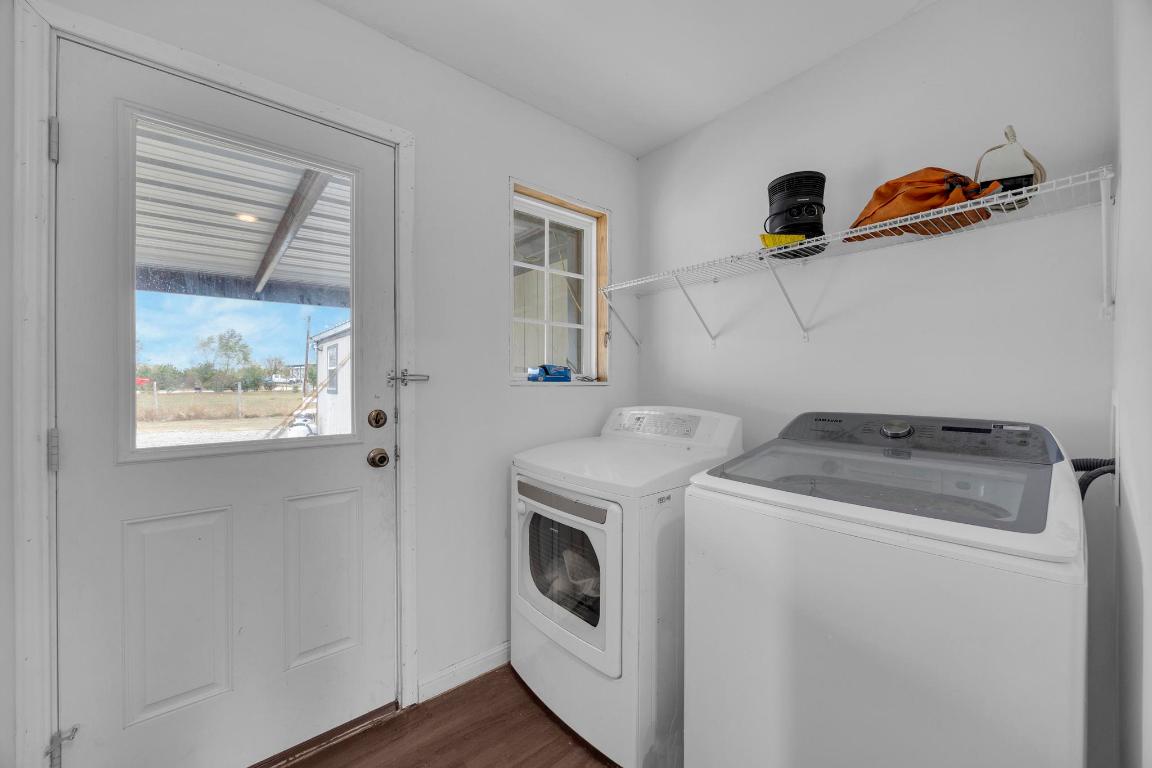 106 Cloudberry Lane Elgin, TX 78621 - Photo 13 of 33 a utility room with dryer and washer