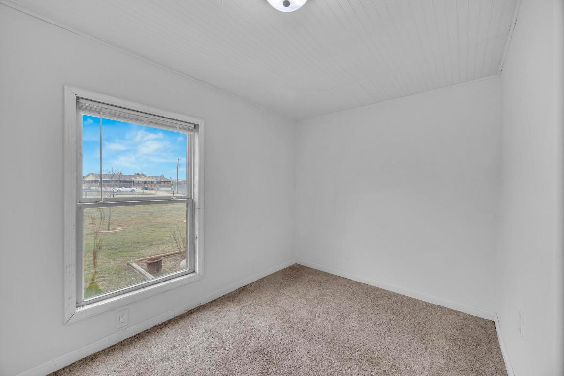 106 Cloudberry Lane Elgin, TX 78621 - Photo 21 of 33 a view of an empty room with a window