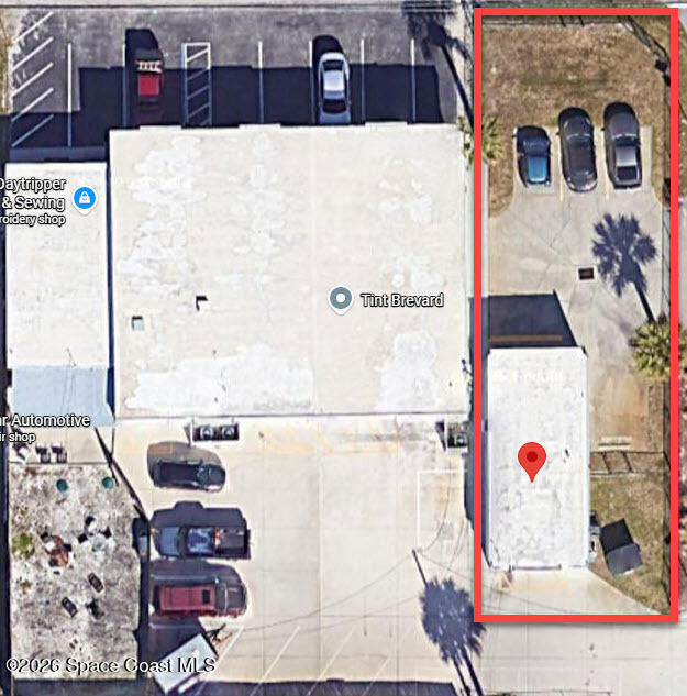 1777 Aurora Road Melbourne, FL 32935 - Photo 5 of 6 with view of rooftop