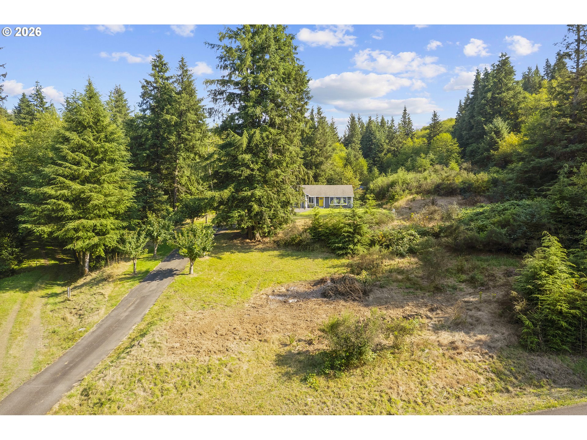 650 Marvin Road Tillamook, OR 97141 - Photo 47 of 48 a view of a yard with an outdoor space