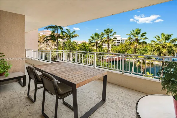 a view of a balcony dining area