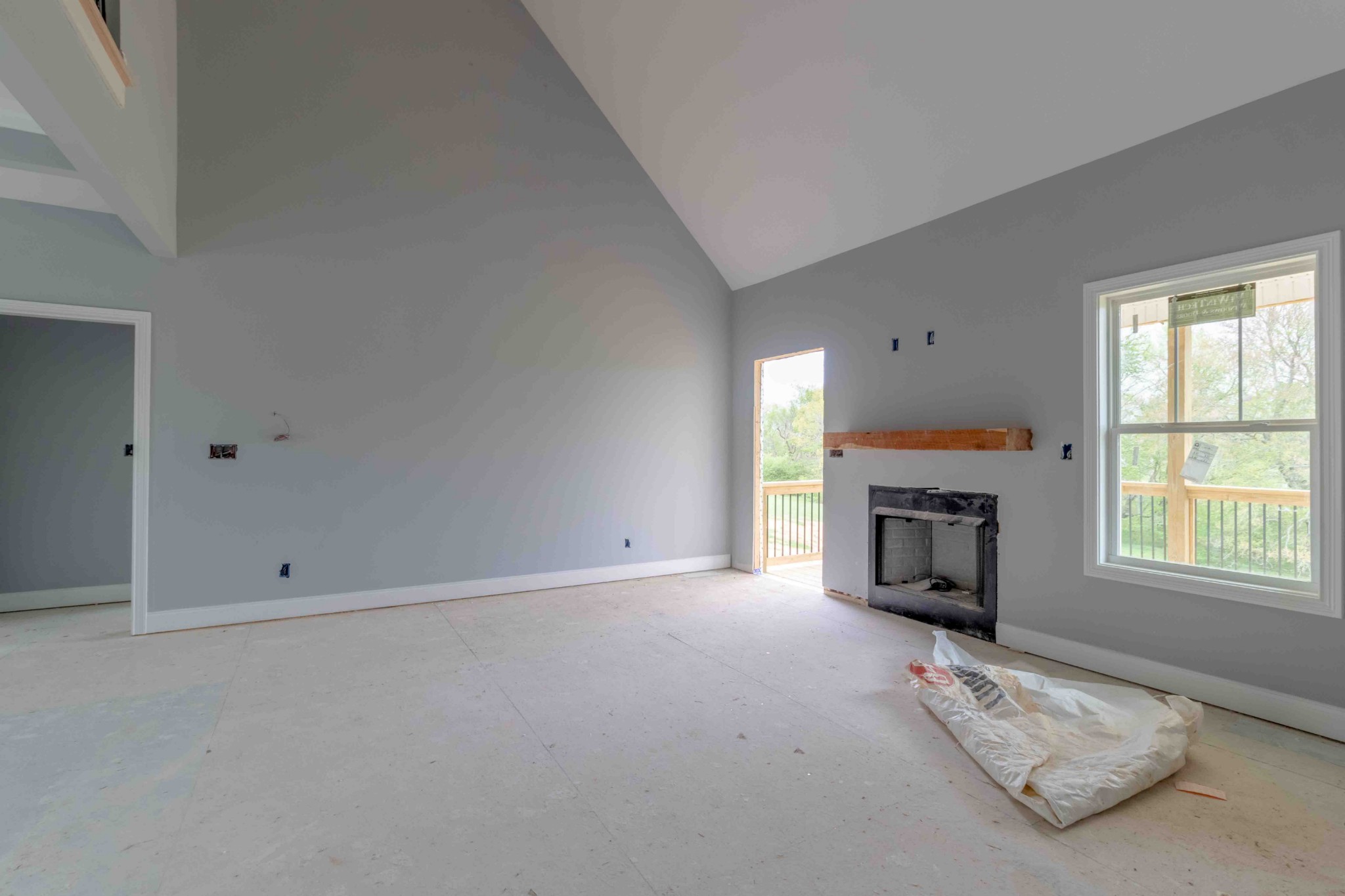 1416 Hickory Point Road Clarksville, TN 37043 - Photo 14 of 18 an empty room with a fireplace and window