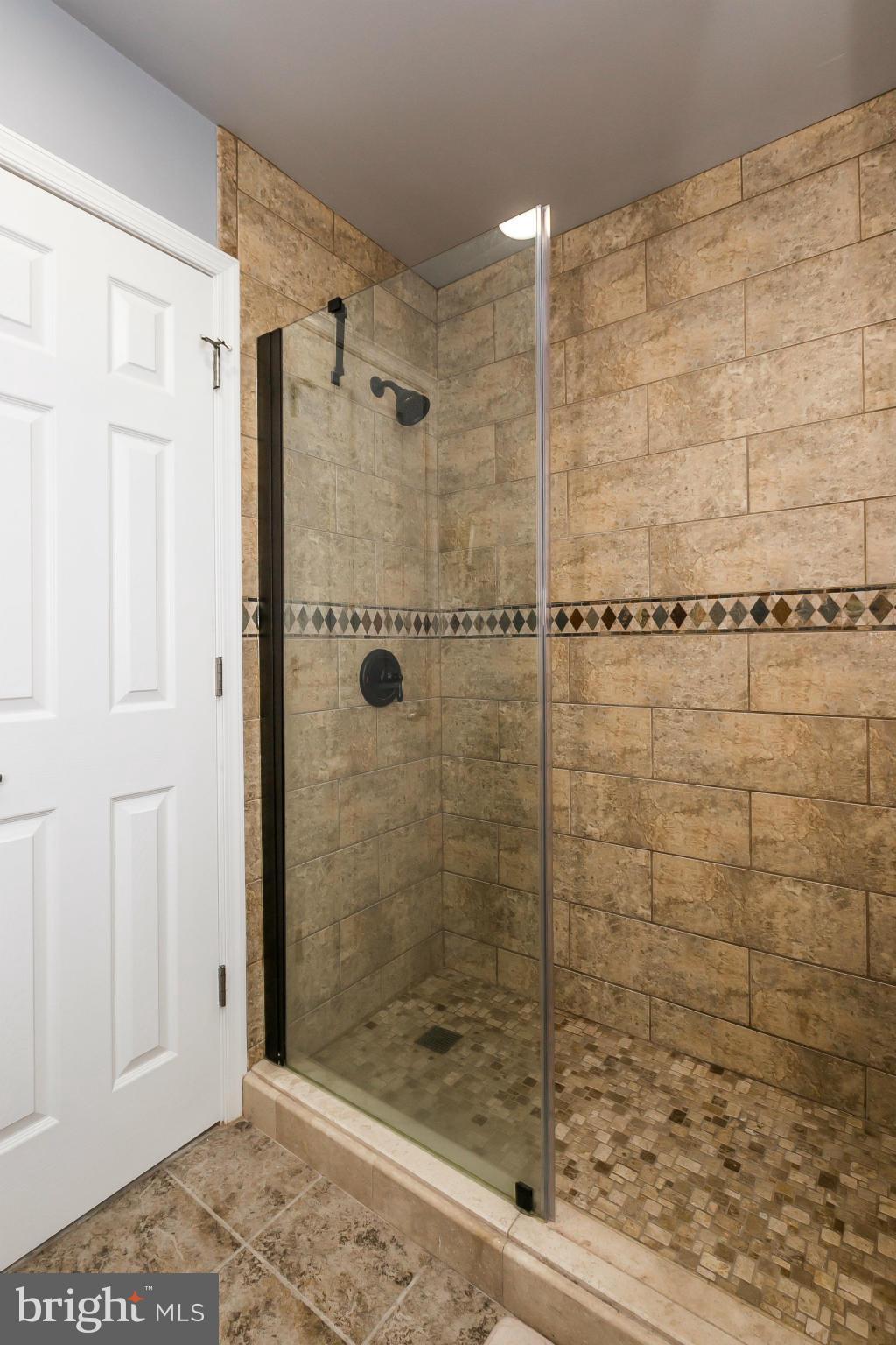 2 West Lee Street, Unit R59 Baltimore, MD 21201 - Photo 19 of 28 a bathroom with a shower and a sink