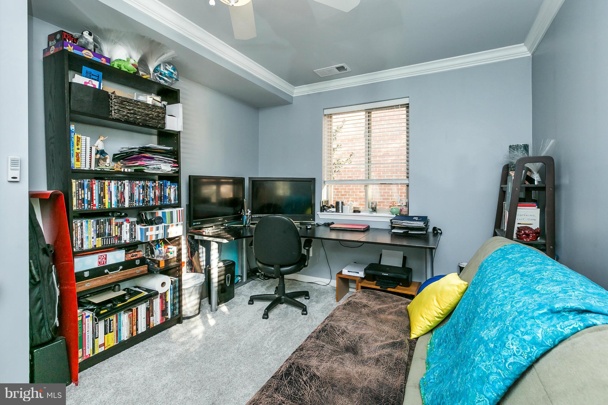 2 West Lee Street, Unit R59 Baltimore, MD 21201 - Photo 22 of 28 a view of a workspace with furniture and toys