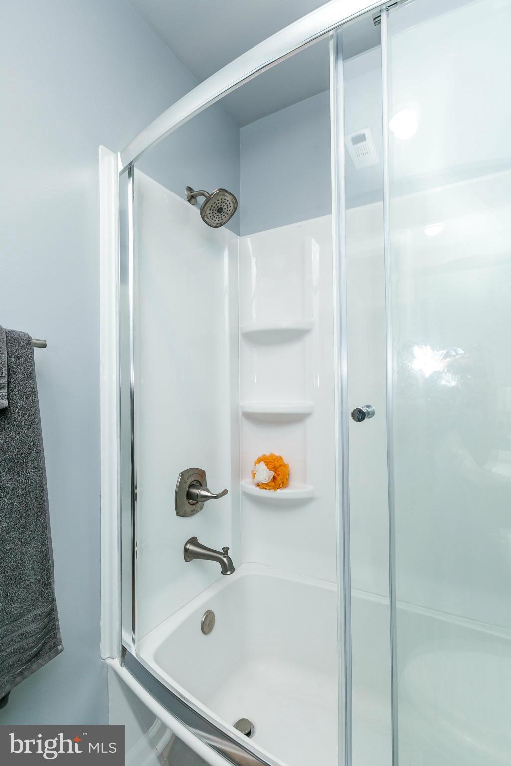 2 West Lee Street, Unit R59 Baltimore, MD 21201 - Photo 25 of 28 a bathroom with a bathtub and shower