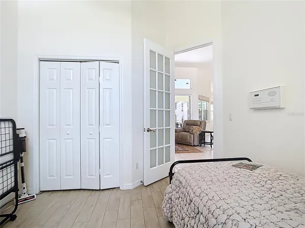 a room with furniture and flat screen tv