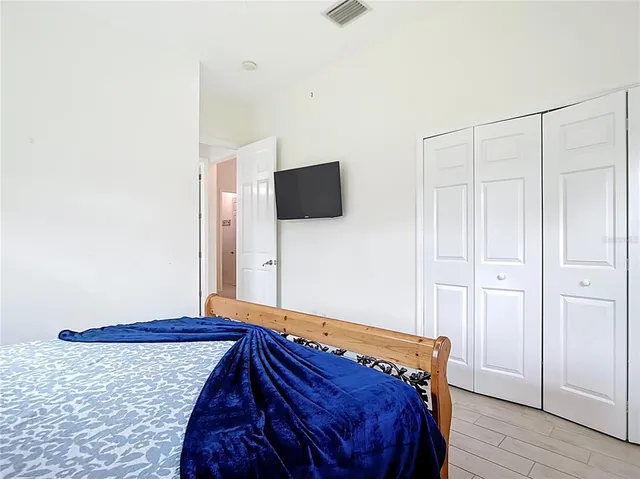 a bathroom with a glass shower door