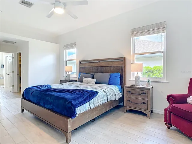 a bathroom with a bathtub and a window