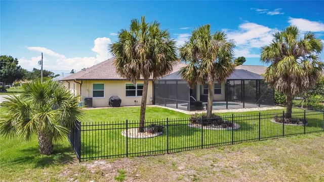 a view of a swimming pool with a porch