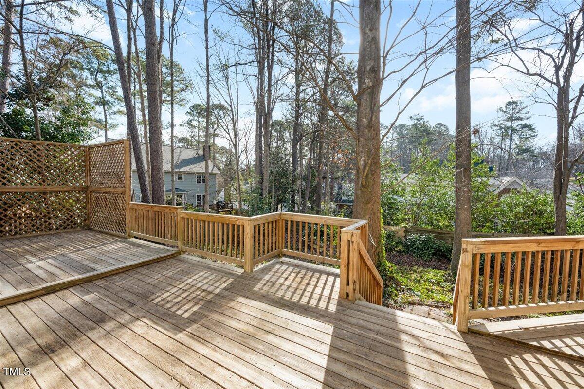 2205 Pastille Lane Raleigh, NC 27612 - Photo 24 of 31 a view of balcony with wooden floor and outdoor space