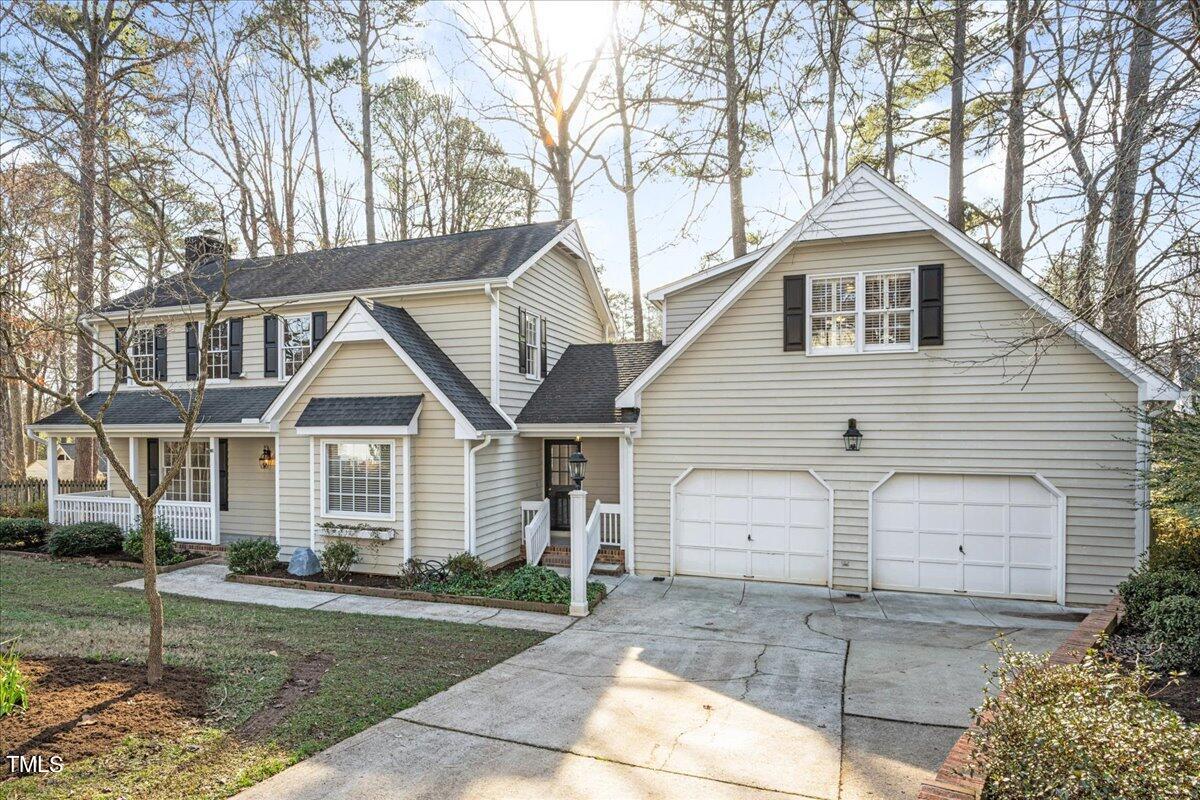 2205 Pastille Lane Raleigh, NC 27612 - Photo 29 of 31 a front view of a house with a yard and garage