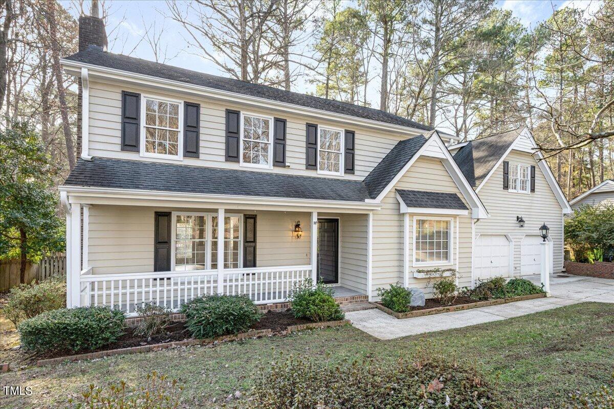 2205 Pastille Lane Raleigh, NC 27612 - Photo 30 of 31 a front view of a house with garden